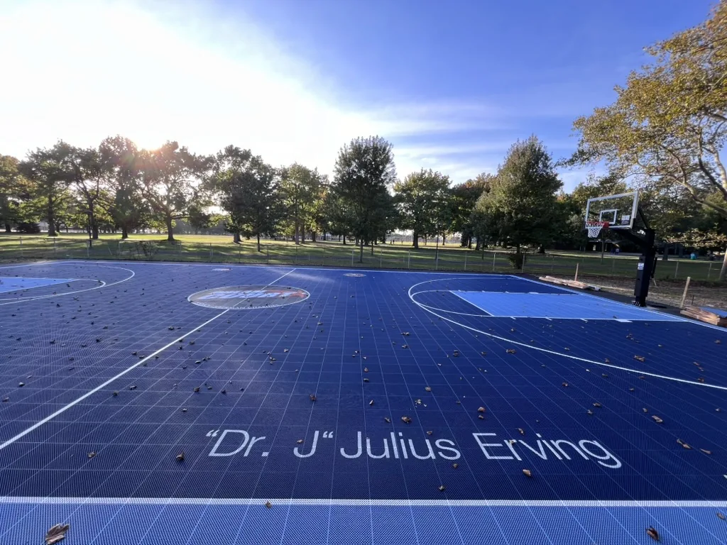 Navy full court with custom center logo at a park